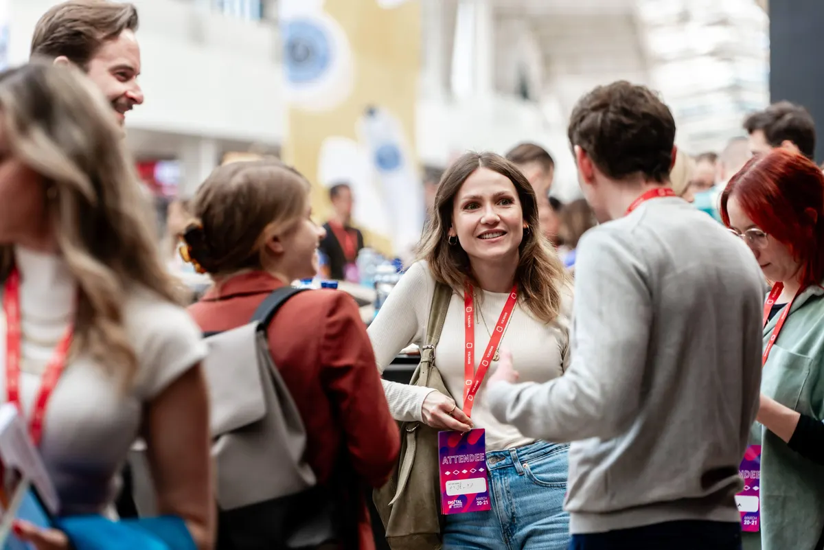 Attendees networking between sessions at a past Digital Marketing Europe conference in Vilnius